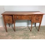 George III design mahogany serpentine fronted sideboard with central drawer flanked by deep