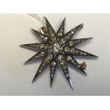 Victorian gold starburst diamond brooch