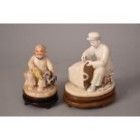 2 late C19th Chinese stained ivory carvings of seated figures, 15cmH max, wood stands. (2)