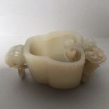 Chinese pale jade brush washer with elephant head ring and figural terminals 9.5cmW