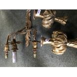 Gilt metal three branch wall light and two gilt wood finials