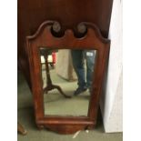 Queen Anne style walnut mirror with swan neck pediment