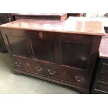 C18th oak mule chest, the planked top over a triple panel front and 2 drawers on bracket feet,