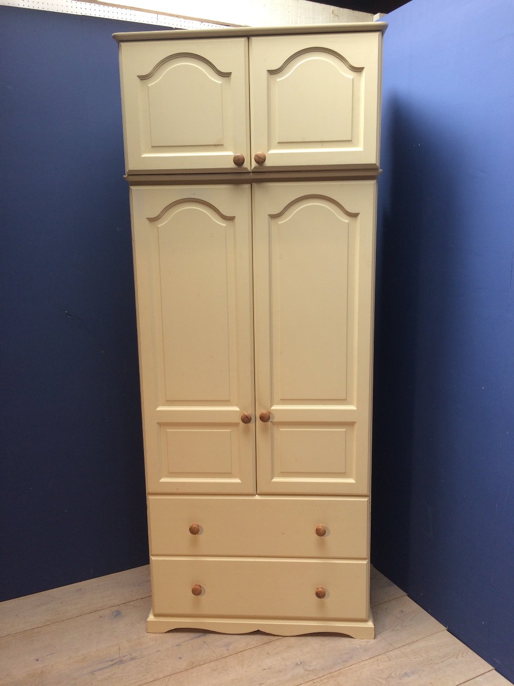 Painted two piece bedroom suite, a cream painted chest of drawers & a similar two tier coffee table