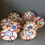 11 assorted Japanese Imari plates