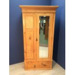 Small pine wardrobe with mirrored door and drawer beneath, 97cmW