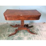Regency mahogany D-shaped fold over card table on 4 sabre legs
