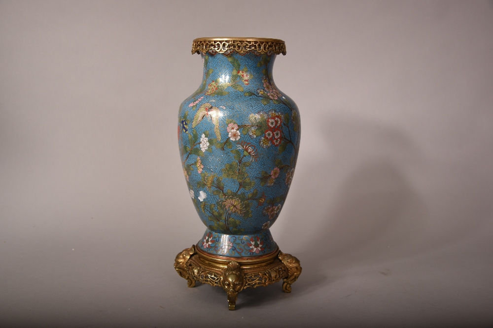 C19th Chinese mounted cloisonne vase decorated with butterflies flying amid leafy floral sprays,