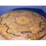 Victorian walnut floral marquetry inlaid breakfast table, the circular top on carved tripod base,