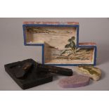 Chinese inkstone and four ink blocks; together with a famille rose Z-shaped 'landscape' dish, 20cm