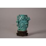 Chinese carved turquoise vase in the form of 'three friends', Qing dynasty, wood stand, overall 9.