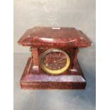 C19th French rouge marble mantle clock of architectural form with Japy Freres two train movement