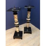 Pair of ebonised & Zolnay porcelain stands, 102cm H