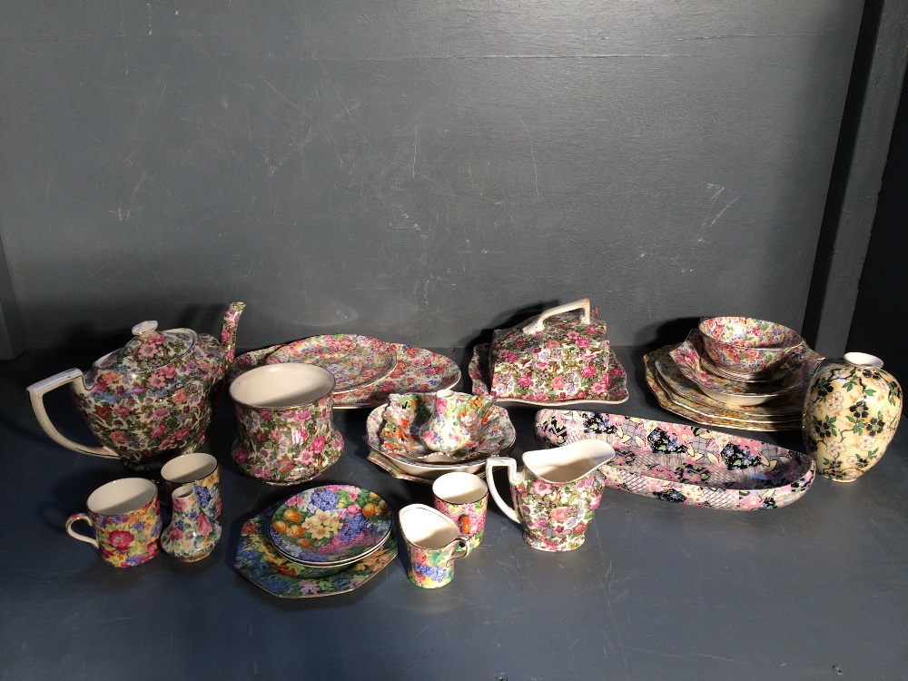 Quantity of floral chintz teaware and a Ducal vases