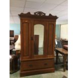 Victorian walnut wardrobe with mirrored door above a drawer, 134cmL (at cornice)