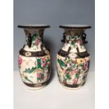 Pair of late C19th Chinese crackle glaze vases in famille verte palette, decorated with equestrian