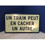 Metal French Railway sign, 'Un Train Peut En Cacher Un Autre' (Translation: A Train Can Hide