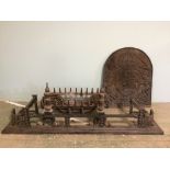 Cast iron fireback, hearth & pair of fire dogs with modern metal fender