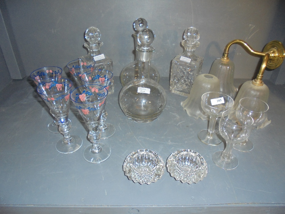 2 pairs of glass decanters, 5 hollow stem old drinking glasses, 10 painted glass champagne flutes