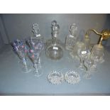 2 pairs of glass decanters, 5 hollow stem old drinking glasses, 10 painted glass champagne flutes