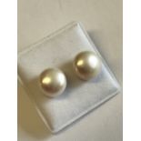 Pair of large freshwater pearls set in silver