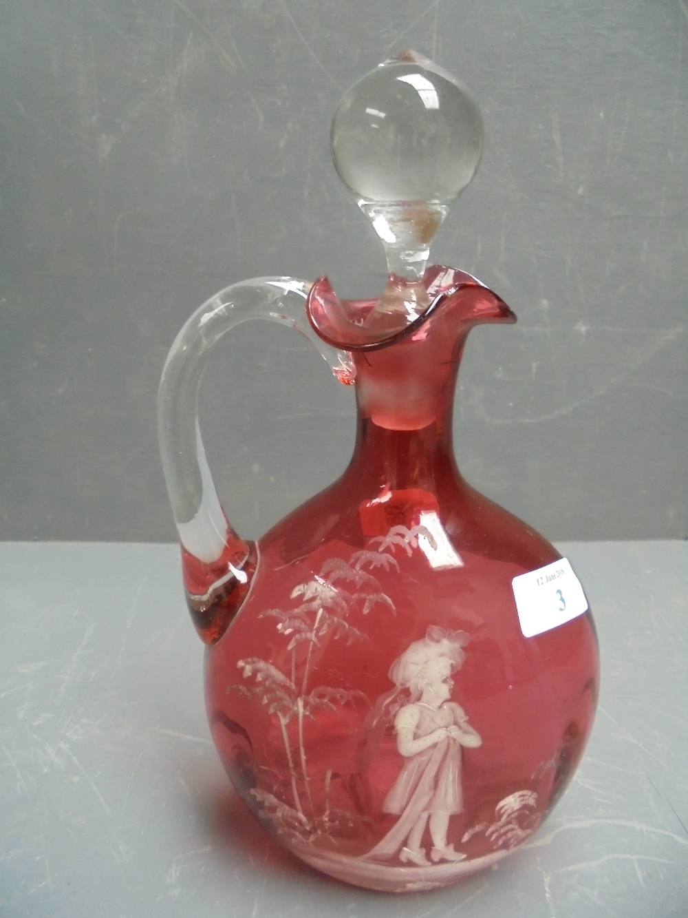 Mary Gregory cranberry coloured glass claret jug & stopper