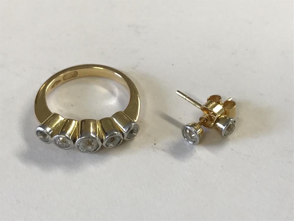 18ct gold & diamond 5 stone ring and a matching pair of stud earings,with full details of