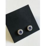 Pair of 18 carat white gold, tanzanite & diamond earrings of 1.75 carats total weight