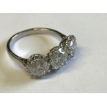 Impressive 18 carat three stone diamond ring of 3.95 carats, colour H, clarity Si