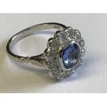 18 carat white gold, sapphire & diamond daisy style ring of 3 carats approx.