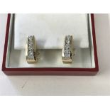 Pair of yellow metal and diamond earings, approx 1ct of stones, 14ct tested but no mark