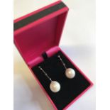 Pair of white gold substantial baroque pearl drop earrings