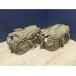 Two green canvas and leather trim holdall suitcases (please remember to check condition of lots