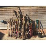 Large quantity of garden tools including spades,hoes,forks,etc (please remember to check condition