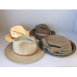 Four hats: 1 ladies tweed, 1 straw, 2 trilby style (please remember to check condition of lots