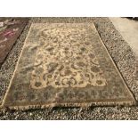 Heavy duty wool rug with beige background & grey flower motif