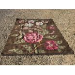 Large Oka wool rug with floral pattern on a brown background 262x218cm
