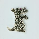 Silver & marcasite brooch in the form of a Scottie dog with ruby eye