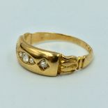 An 18ct gold gypsy ring star set with five old cut diamonds 4.2g size Q