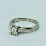 Platinum & diamond single stone ring, central emerald cut diamond in 4 claw setting 0.44ct 4.4g size