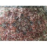 Good quality rug with peach ground and all over stylized pattern in soft palette 207x292