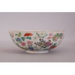 Chinese famille rose bowl, painted overall with butterflies and blossoming floral sprigs, Daoguang