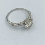 Impressive 18ct white gold diamond ring the central stone of 2.4cts