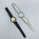 2 Gentlemans wristwatches Baume & Mercier white metal case with round face, second an Admirals cup