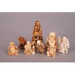 Group of eight C19th Chinese and Japanese carved ivory figures