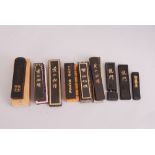 A group of nine C19th/20th Chinese ink cakes, of rectangular form and each decorated with