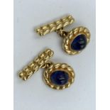 Pair of 18ct gold & cabochon sapphire cufflinks