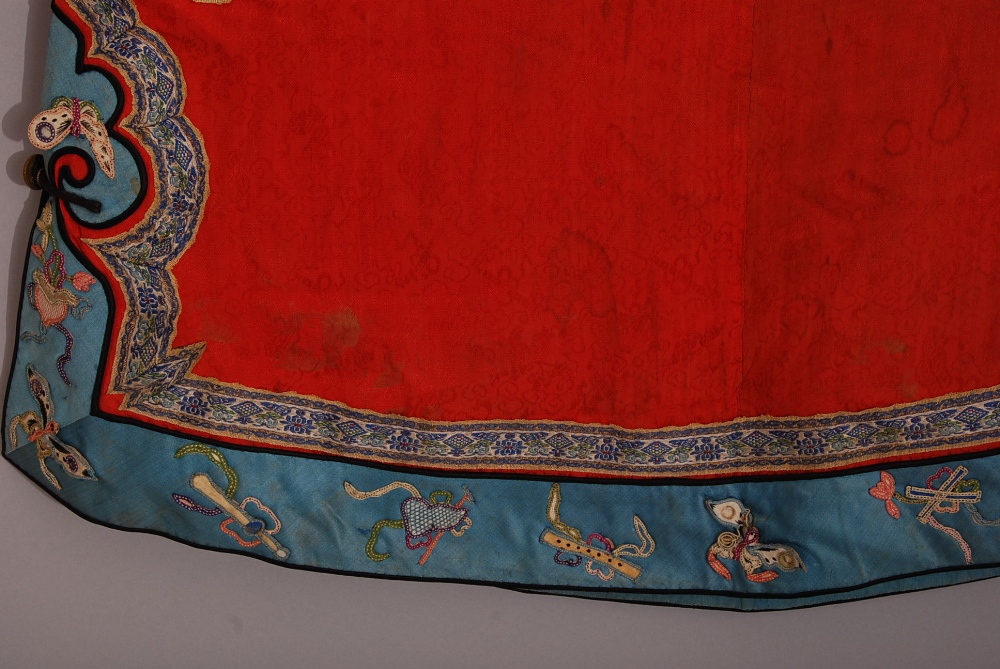 C19th Chinese lady's red silk robe, trimmed in blue and embroidered with auspicious objects, 120cm - Image 4 of 13