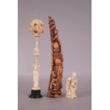 C19th Chinese carved ivory figure of Shoulao, 27.5cm high; together with a small ivory Shoulao,