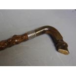 Continental thorn white metal mounted walking stick, the handle fashioned as a horses hoof